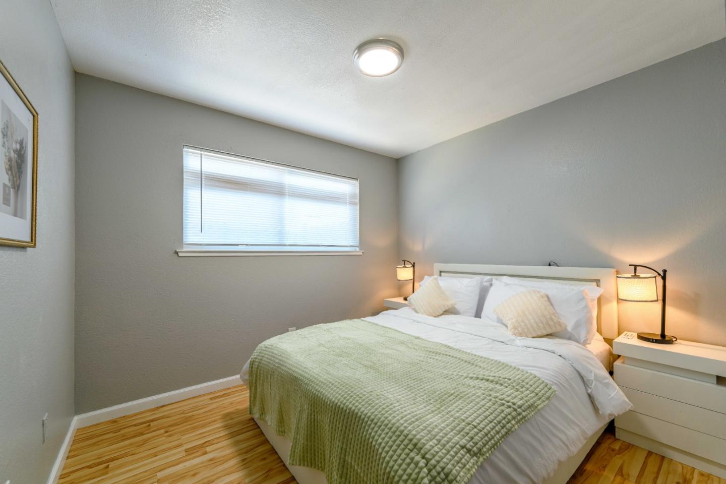 8617 Lodestone Circle Elk Grove, CA 95624 - Photo 10 of 23 a bedroom with a bed and window