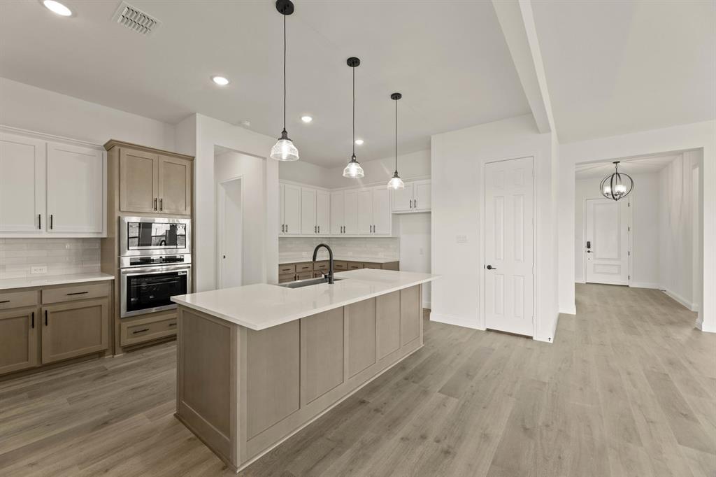 124 Evanston Court Rhome, TX 76078 - Photo 11 of 28 124 Evanston-Kitchen-2