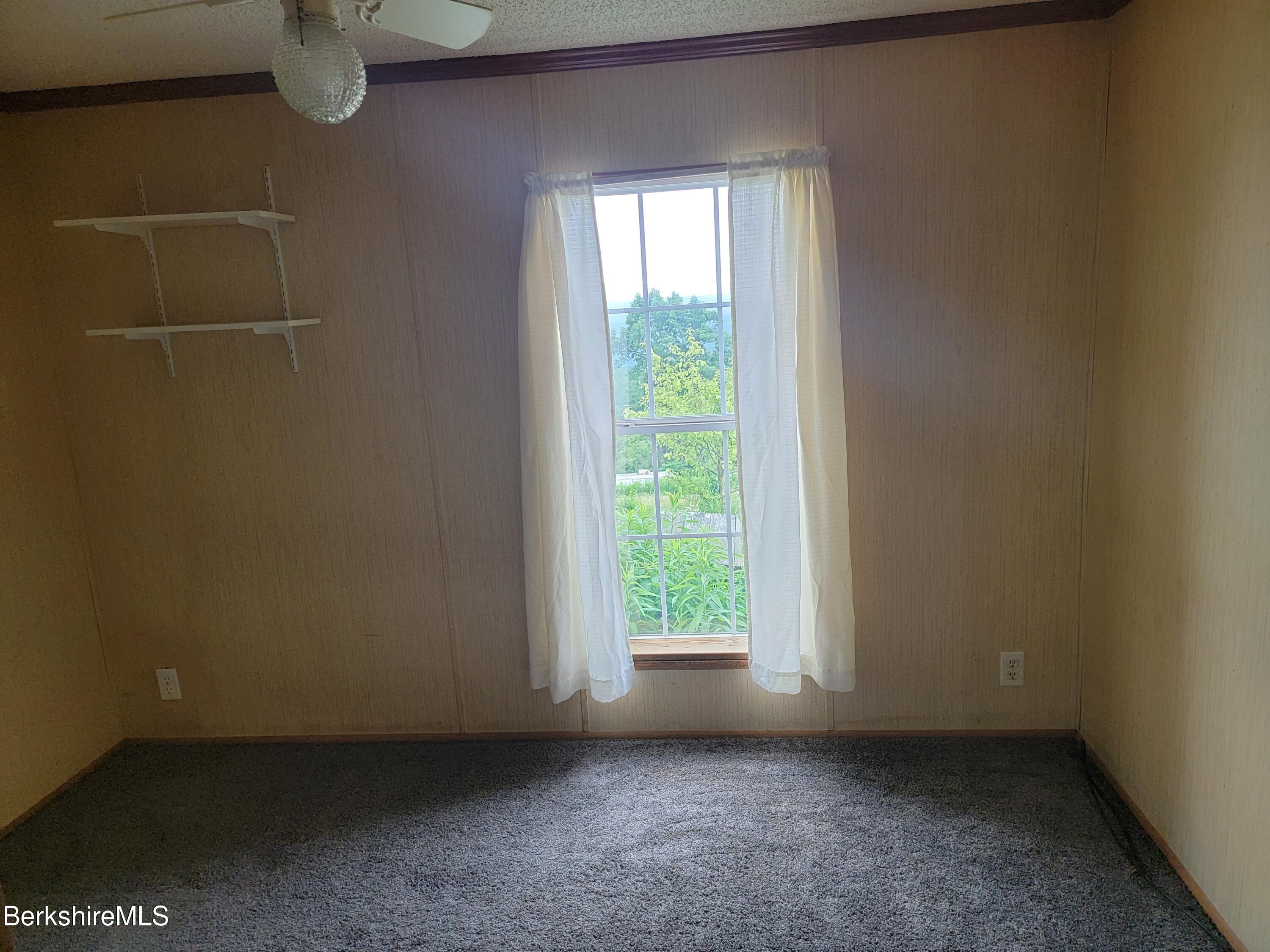 47 Moore's Road North Adams, MA 01247 - Photo 11 of 19 a view of a room with rack and window