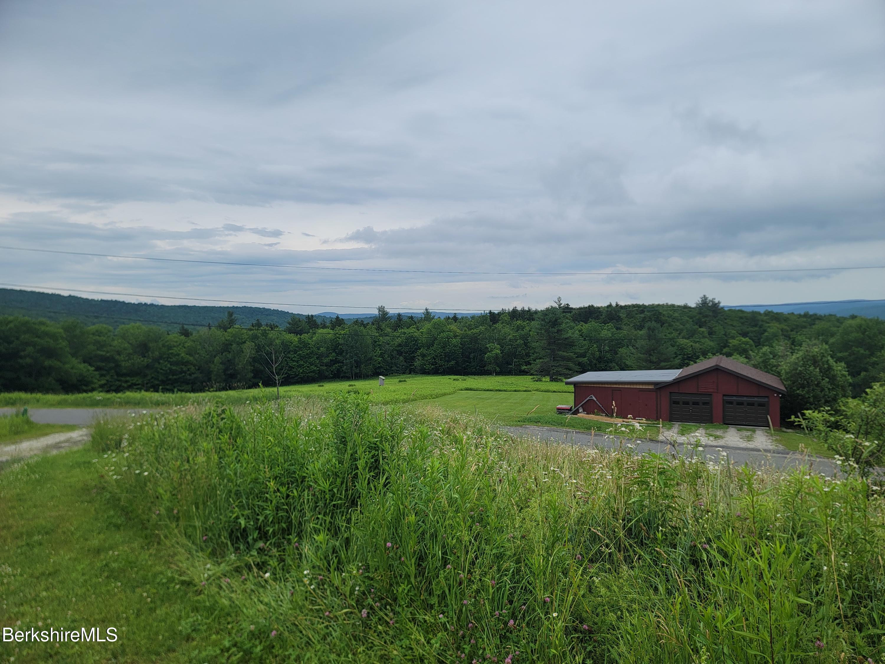 47 Moore's Road North Adams, MA 01247 - Photo 4 of 19 a view of an outdoor space and a yard