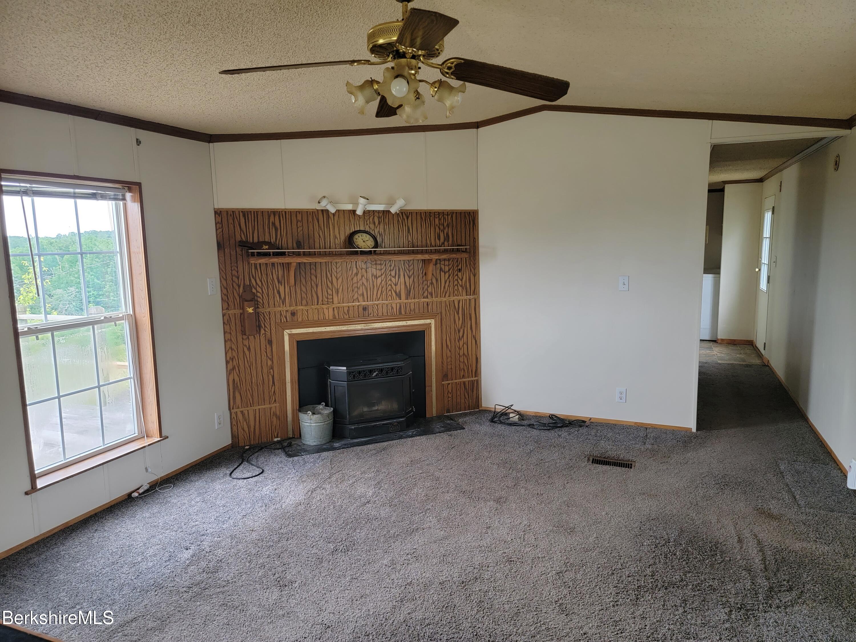 47 Moore's Road North Adams, MA 01247 - Photo 8 of 19 a view of empty room with fireplace