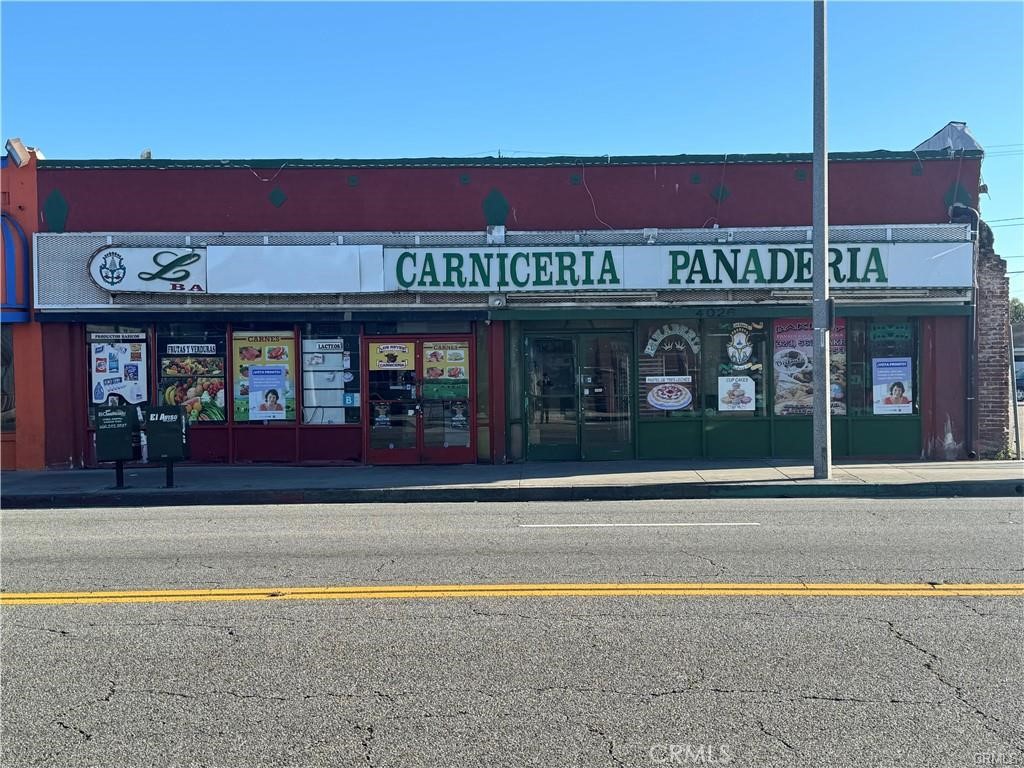 a view of a building with a street