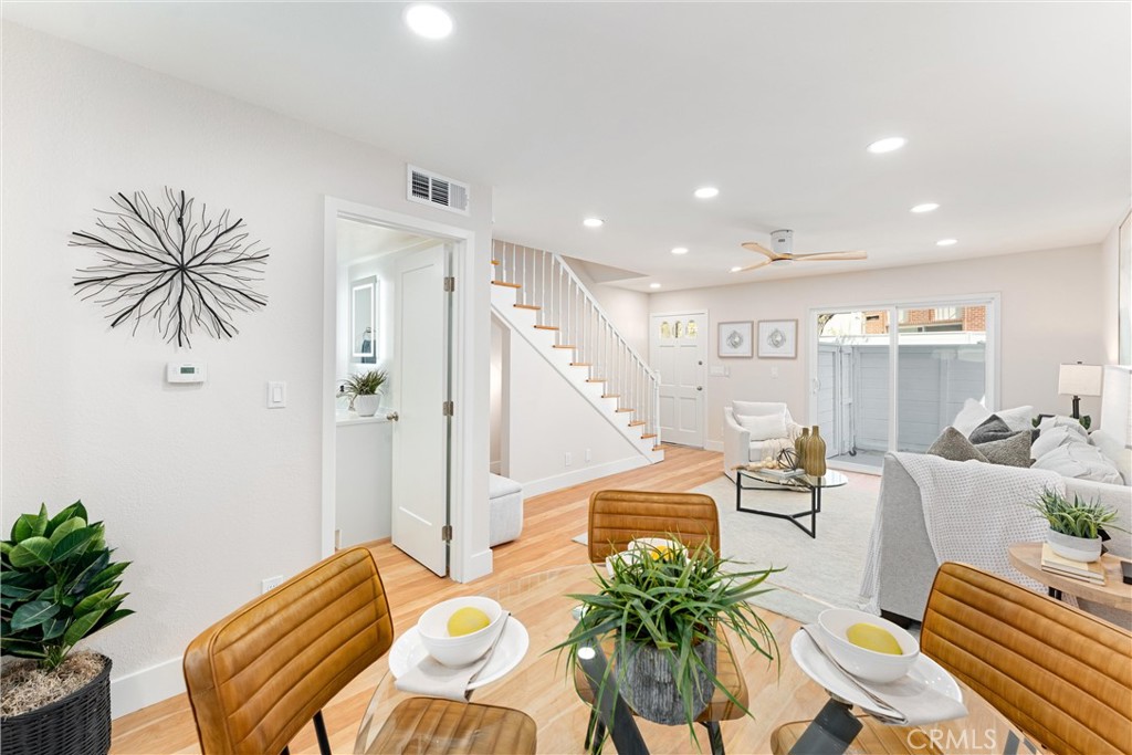 8236 Henderson Green Buena Park, CA 90621 - Photo 11 of 35 a living room with furniture and a potted plant