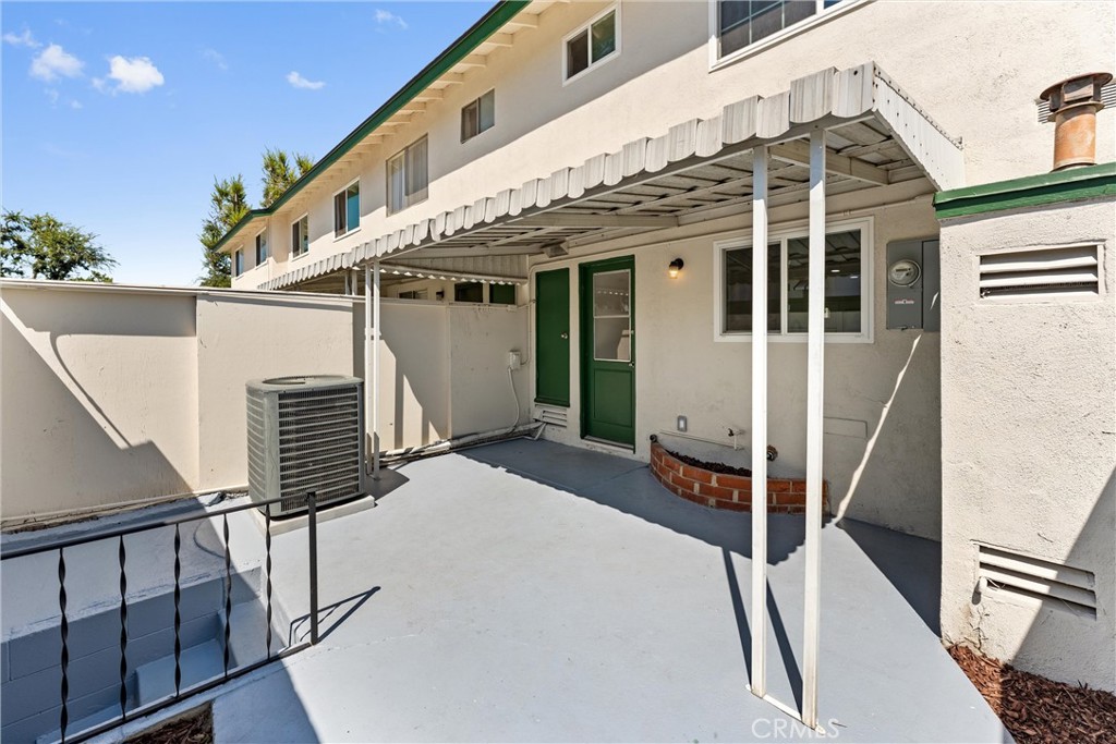 8236 Henderson Green Buena Park, CA 90621 - Photo 24 of 35 a front view of a house with stairs