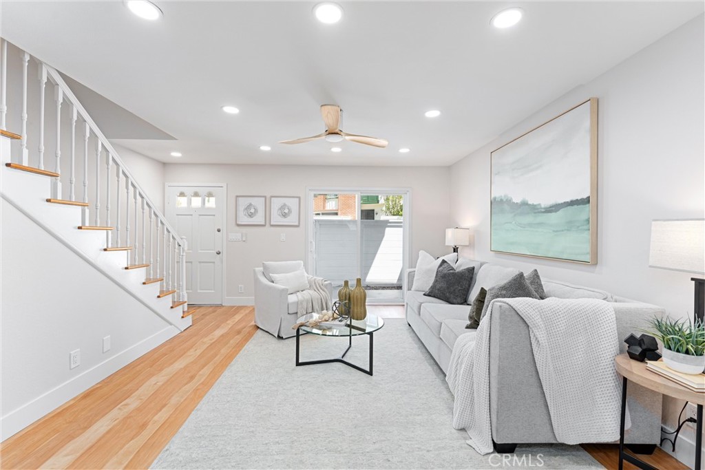 8236 Henderson Green Buena Park, CA 90621 - Photo 7 of 35 a living room with furniture and wooden floor