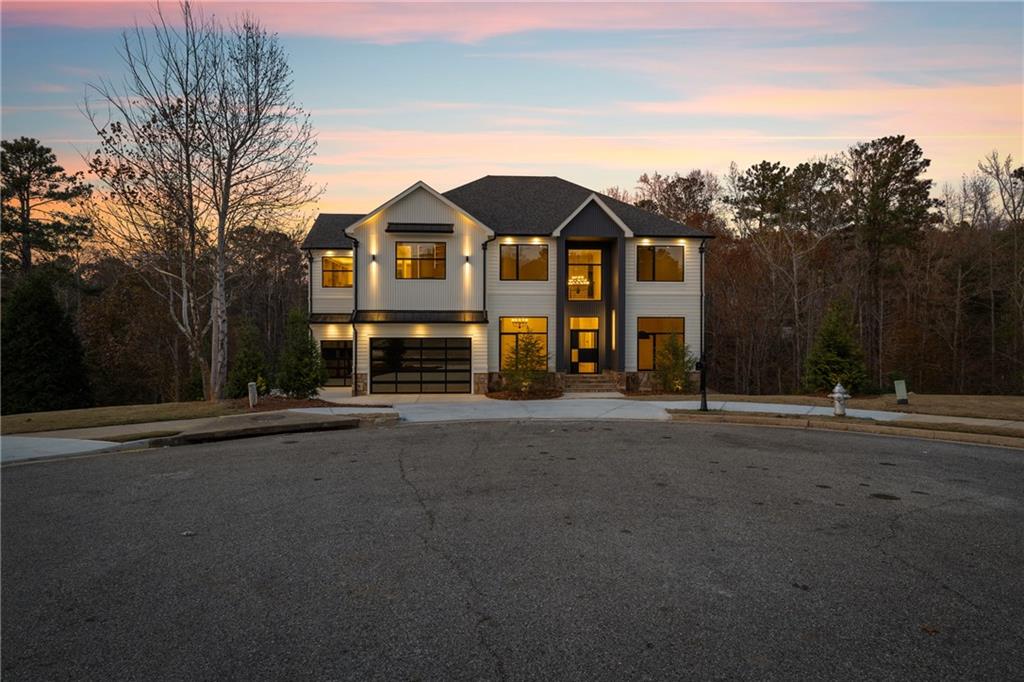 520 Heathmill Court Milton, GA 30004 - Photo 3 of 84 a front view of a house with a yard