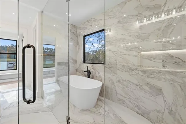 swimming pool view with a backyard space