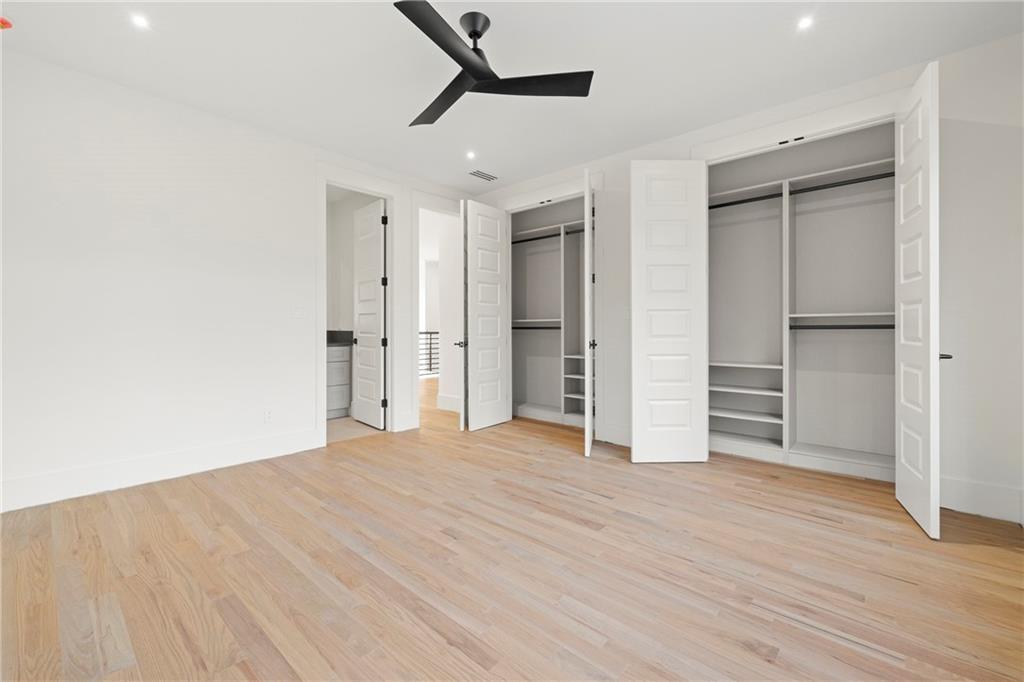 520 Heathmill Court Milton, GA 30004 - Photo 54 of 84 a view of empty room with wooden floor