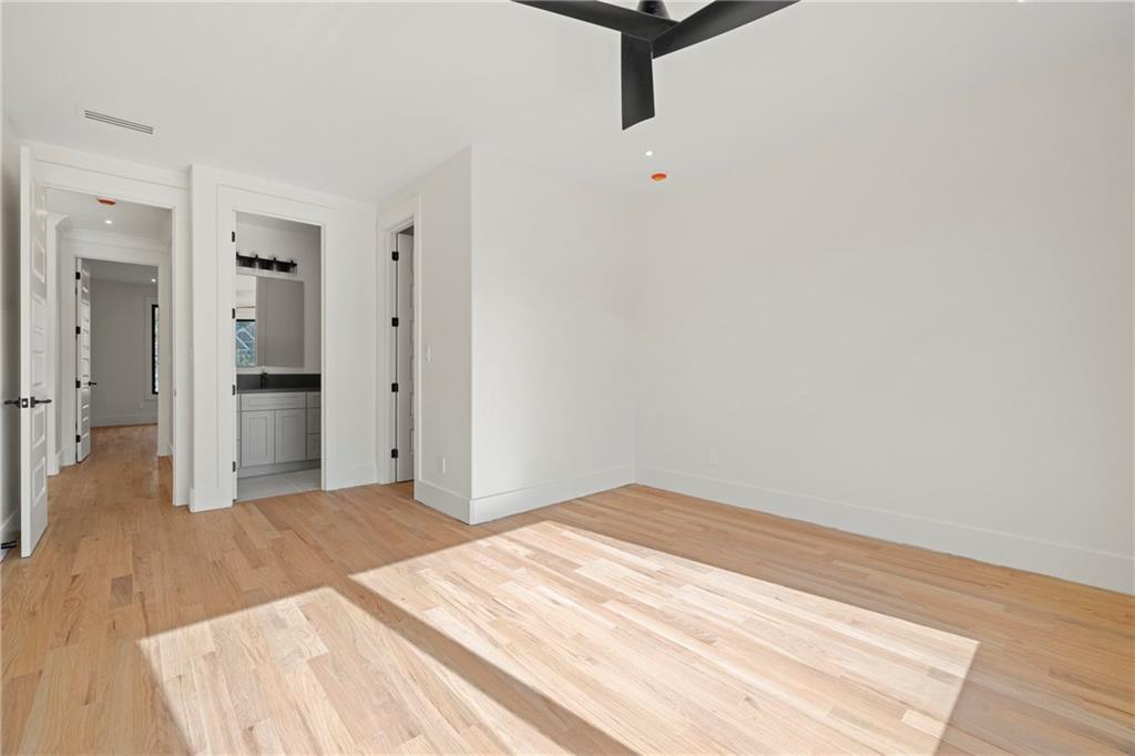 520 Heathmill Court Milton, GA 30004 - Photo 57 of 84 a view of a room with wooden floor