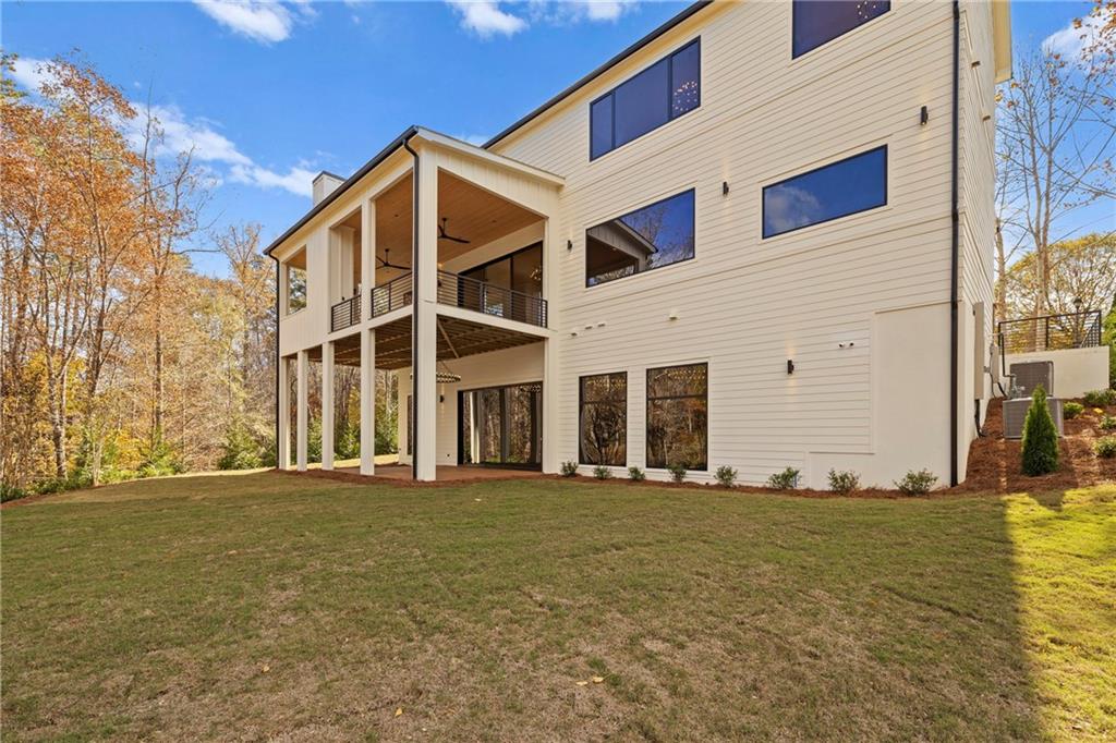520 Heathmill Court Milton, GA 30004 - Photo 69 of 84 a view of a building with a yard