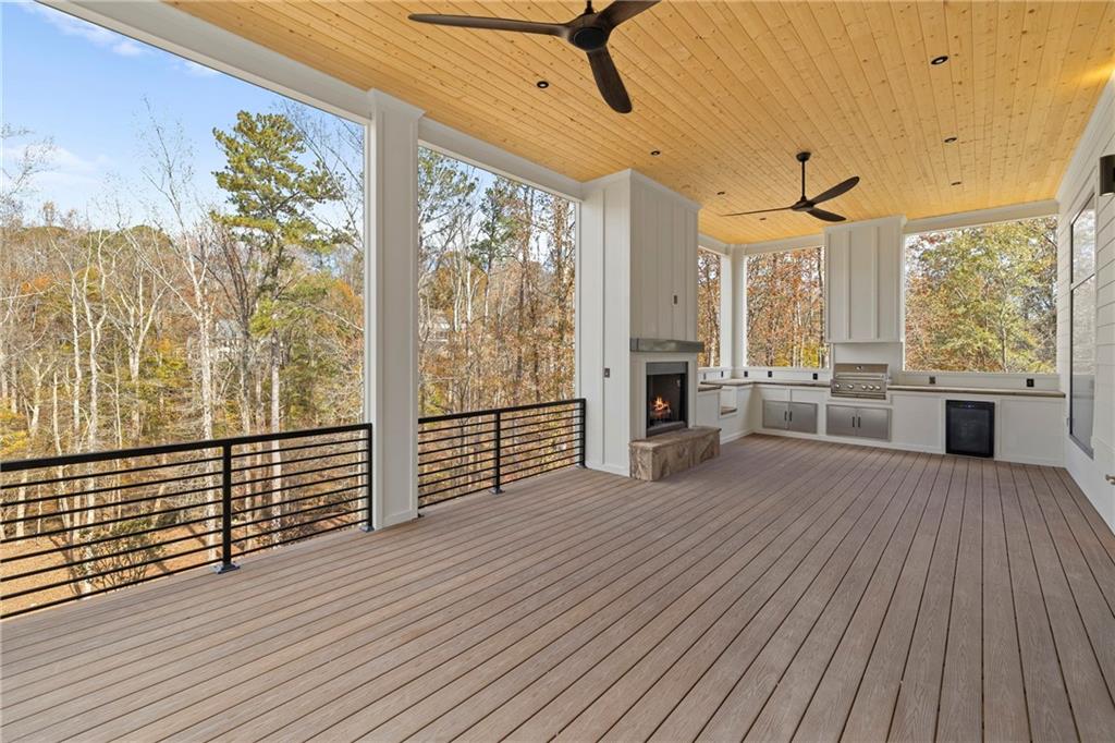 520 Heathmill Court Milton, GA 30004 - Photo 70 of 84 a view of a furniture in wooden floor
