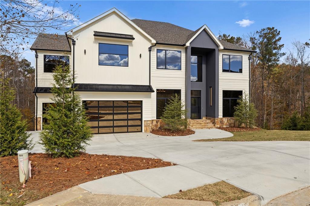 520 Heathmill Court Milton, GA 30004 - Photo 7 of 84 a front view of a house with a yard