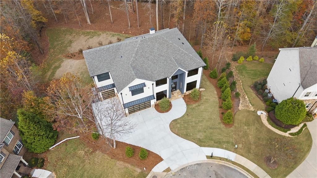 520 Heathmill Court Milton, GA 30004 - Photo 74 of 84 swimming pool view with a backyard space