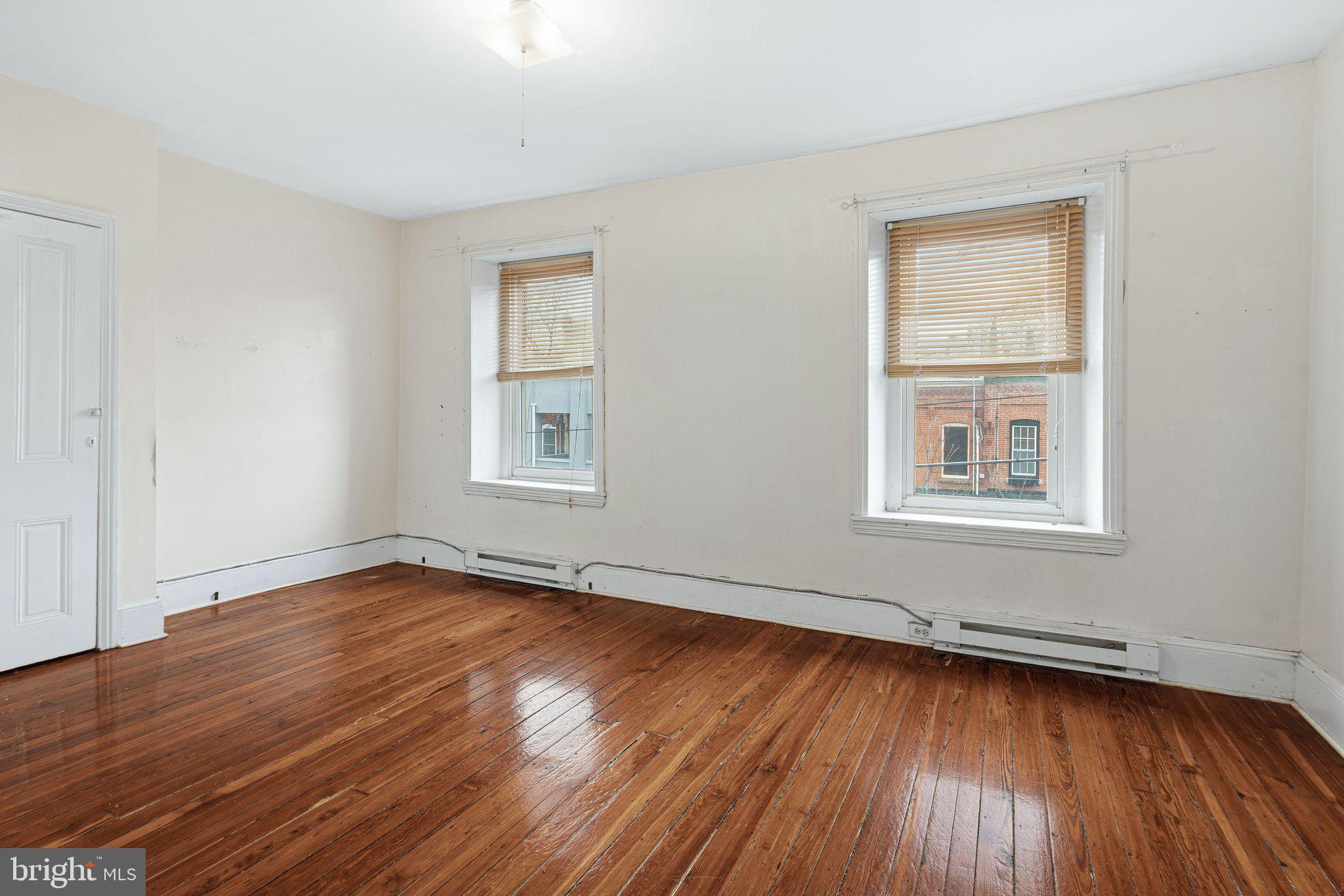 2914 Poplar Street Philadelphia, PA 19130 - Photo 19 of 32 a view of a room with wooden floors and window