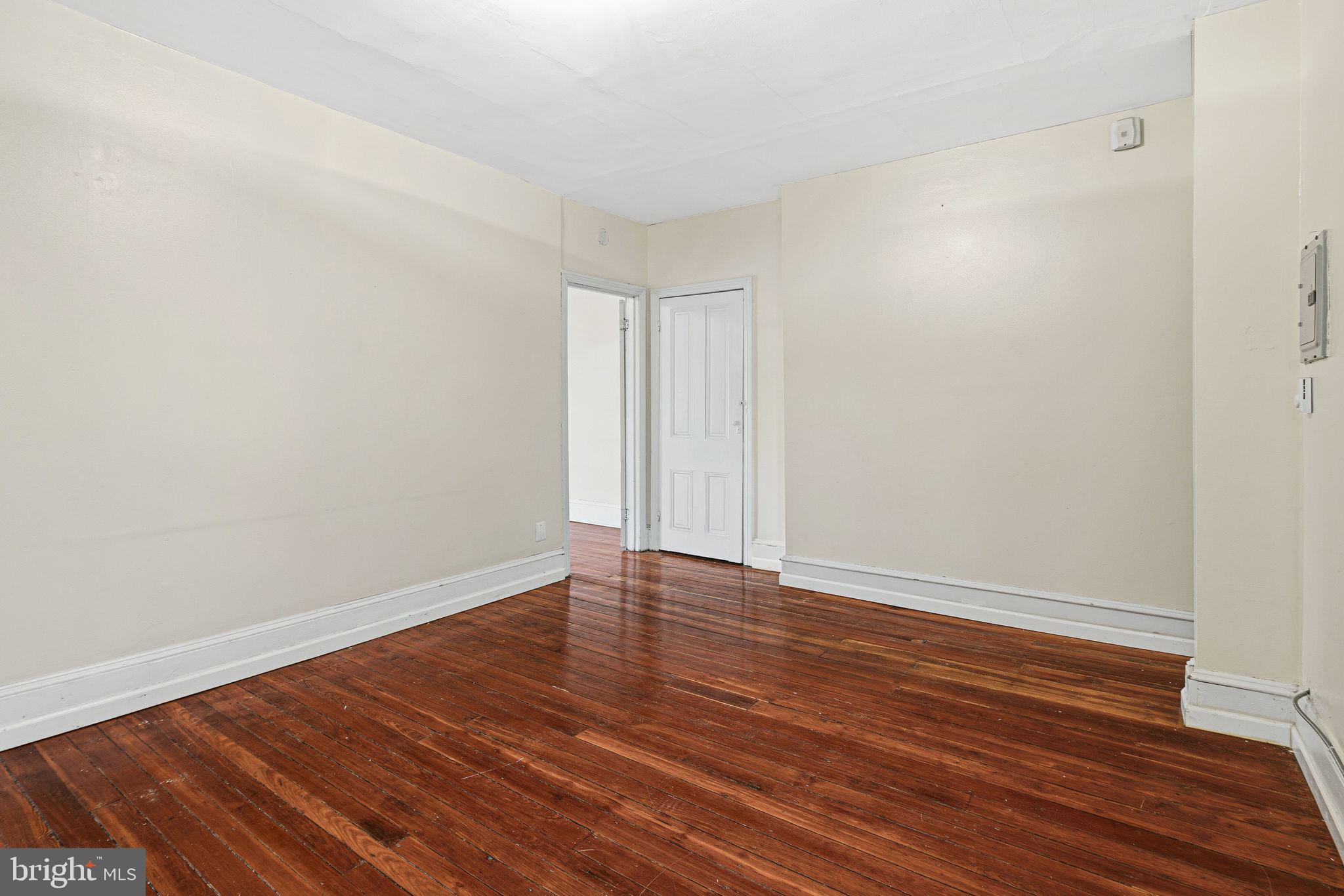 2914 Poplar Street Philadelphia, PA 19130 - Photo 24 of 32 a view of an empty room with wooden floor