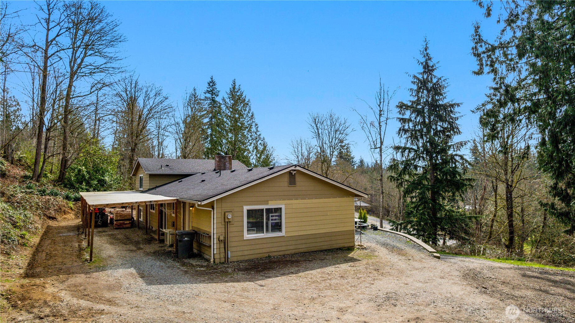 22731 Prairie Road Sedro-Woolley, WA 98284 - Photo 5 of 37 a view of a house with a yard