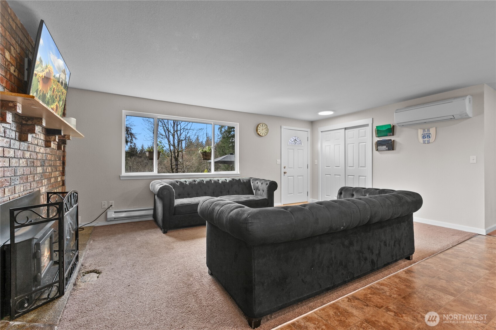 22731 Prairie Road Sedro-Woolley, WA 98284 - Photo 8 of 37 a living room with furniture and a window