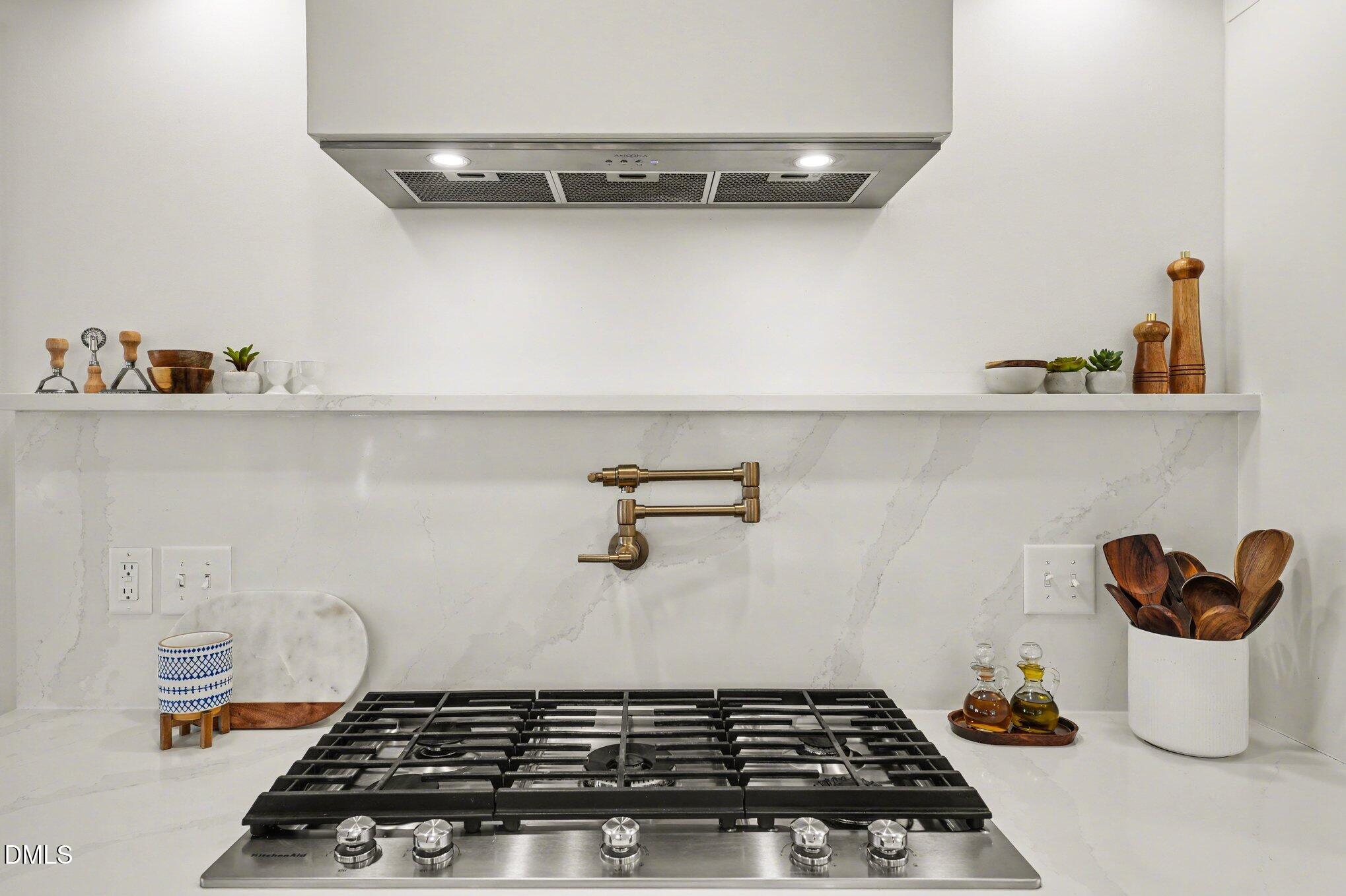 7224 Bedford Ridge Drive Apex, NC 27539 - Photo 5 of 42 custom cook top with pot filler