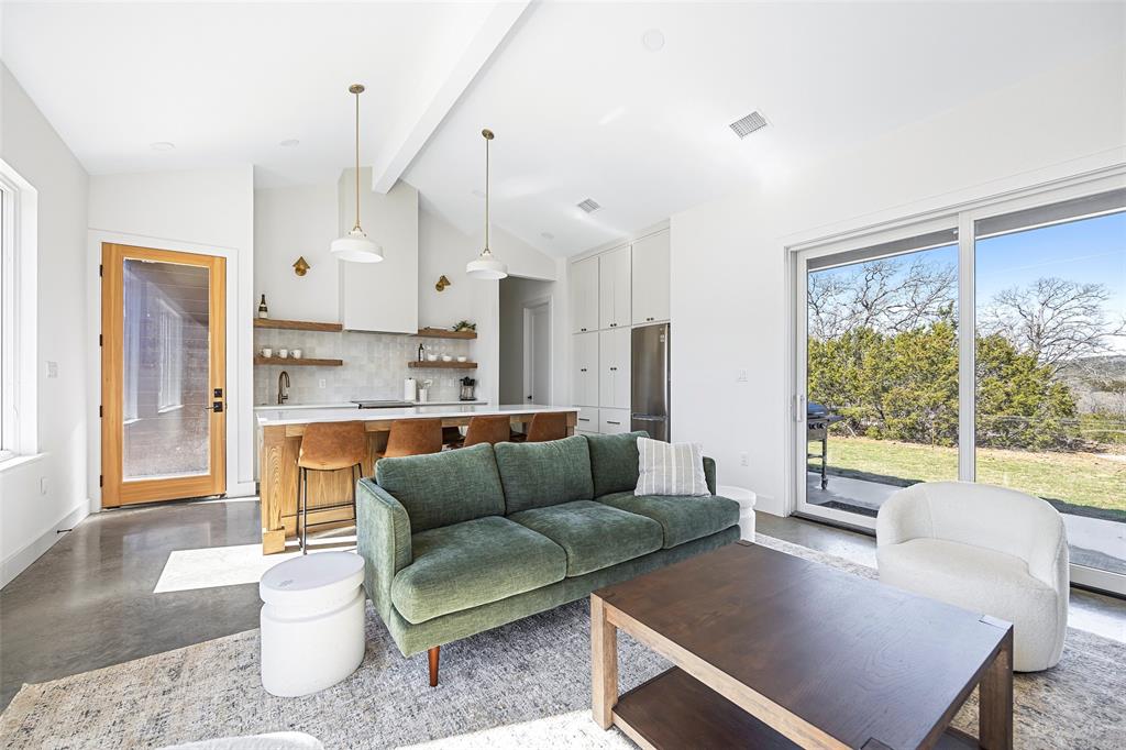 1166 Big Bear Loop Carbon, TX 76435 - Photo 19 of 39 a living room with furniture and a large window