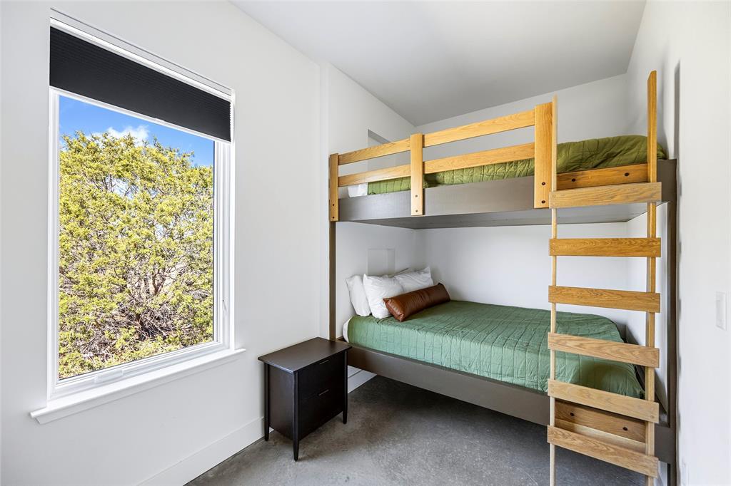 1166 Big Bear Loop Carbon, TX 76435 - Photo 28 of 39 a bedroom with a bed and a window