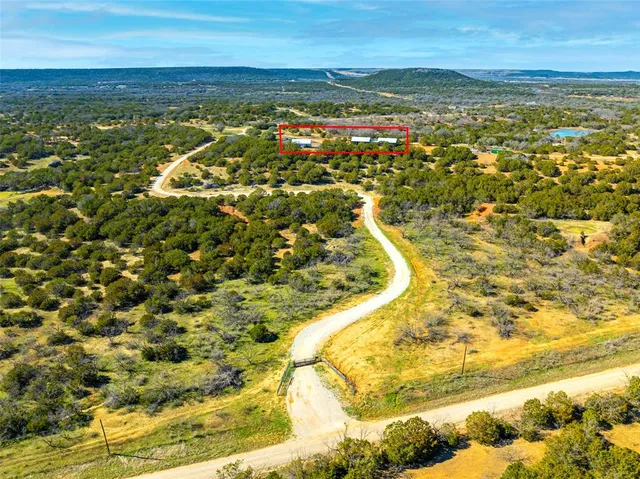 a view of a swimming pool with a lounge chair