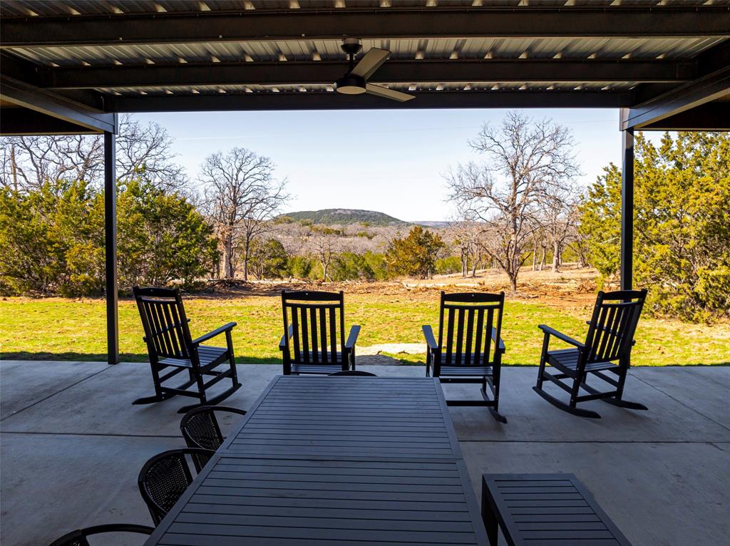 1166 Big Bear Loop Carbon, TX 76435 - Photo 5 of 39 a view of a swimming pool with a lounge chair