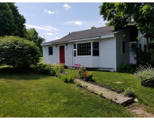 142 Barre Road Hardwick, MA 01037 - Photo 1 of 28 a front view of house with yard and green space