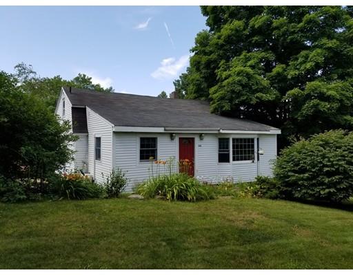 142 Barre Road Hardwick, MA 01037 - Photo 3 of 28 a front view of house with a yard and trees