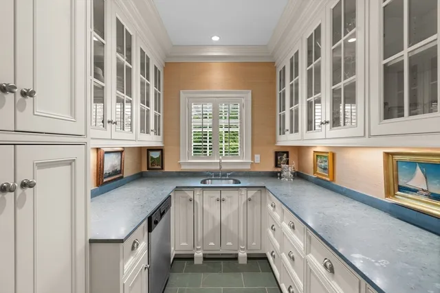 a kitchen with stainless steel appliances granite countertop a stove and a sink
