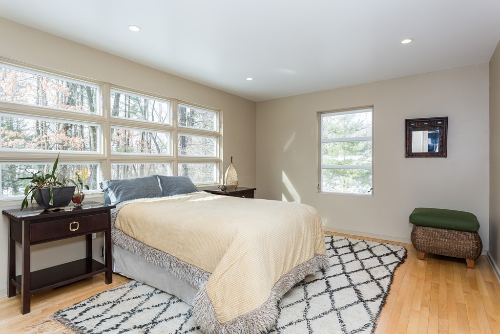 111 Captain Road Longmeadow, MA 01106 - Photo 14 of 30 a bedroom with a bed and a window