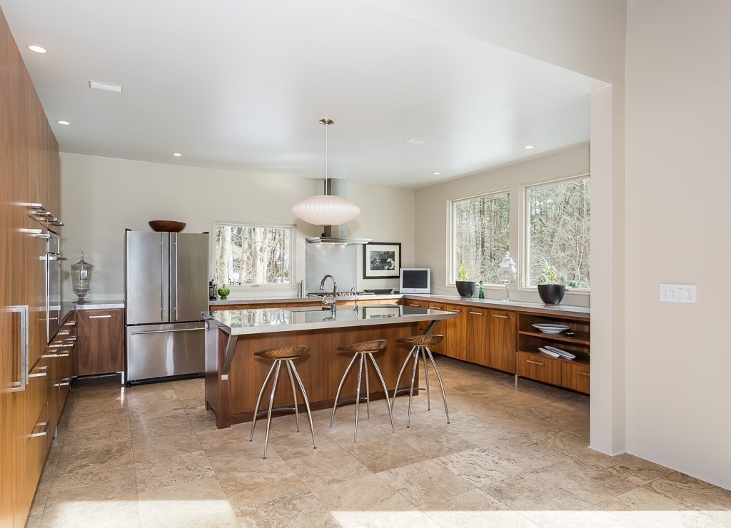 111 Captain Road Longmeadow, MA 01106 - Photo 8 of 30 a large kitchen with a table and chairs