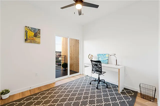 a view of a balcony with chairs