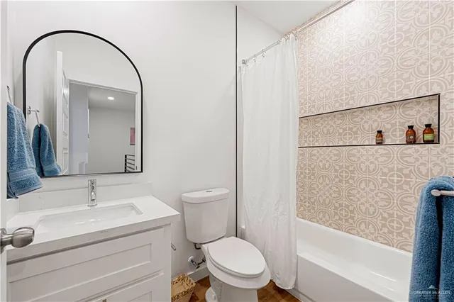 a view of an chairs in the backyard