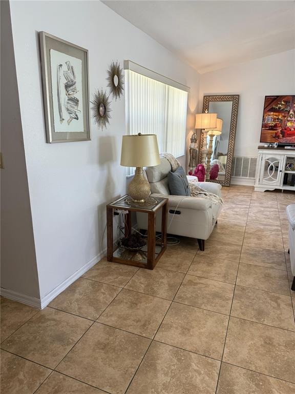 5389 Frost Road Spring Hill, FL 34606 - Photo 16 of 60 a living room with furniture and a window