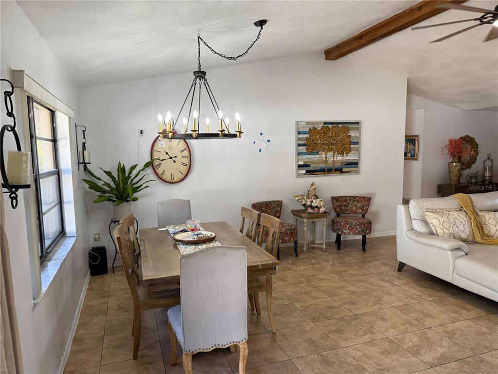 5389 Frost Road Spring Hill, FL 34606 - Photo 23 of 60 a view of a dining room with furniture