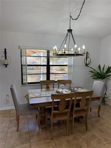 a view of a living room and kitchen