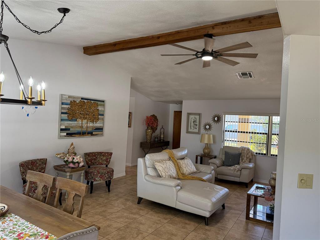 5389 Frost Road Spring Hill, FL 34606 - Photo 26 of 60 a living room with furniture and a window
