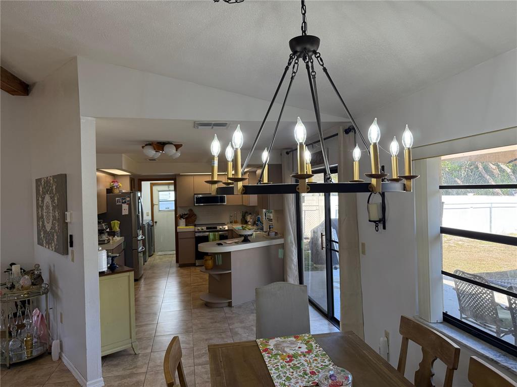 5389 Frost Road Spring Hill, FL 34606 - Photo 27 of 60 a view of a living room and kitchen