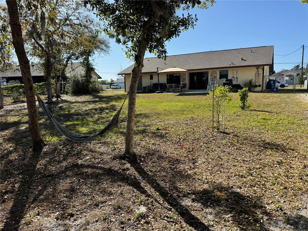 5389 Frost Road Spring Hill, FL 34606 - Photo 55 of 60 a view of a house with a yard