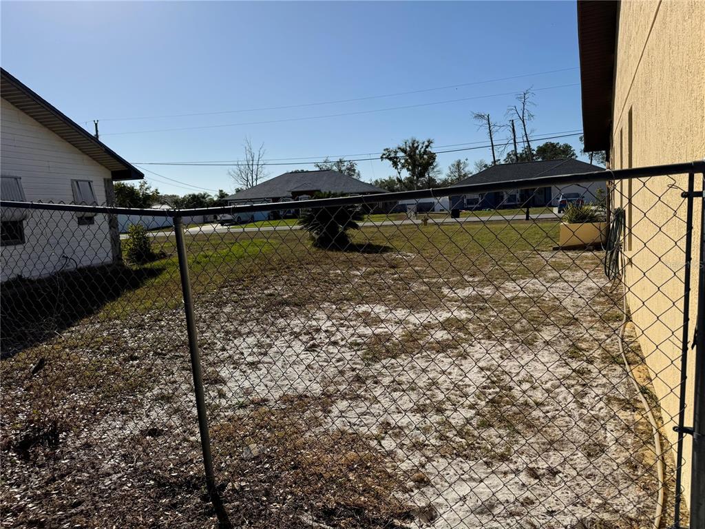 5389 Frost Road Spring Hill, FL 34606 - Photo 57 of 60 a backyard of a house