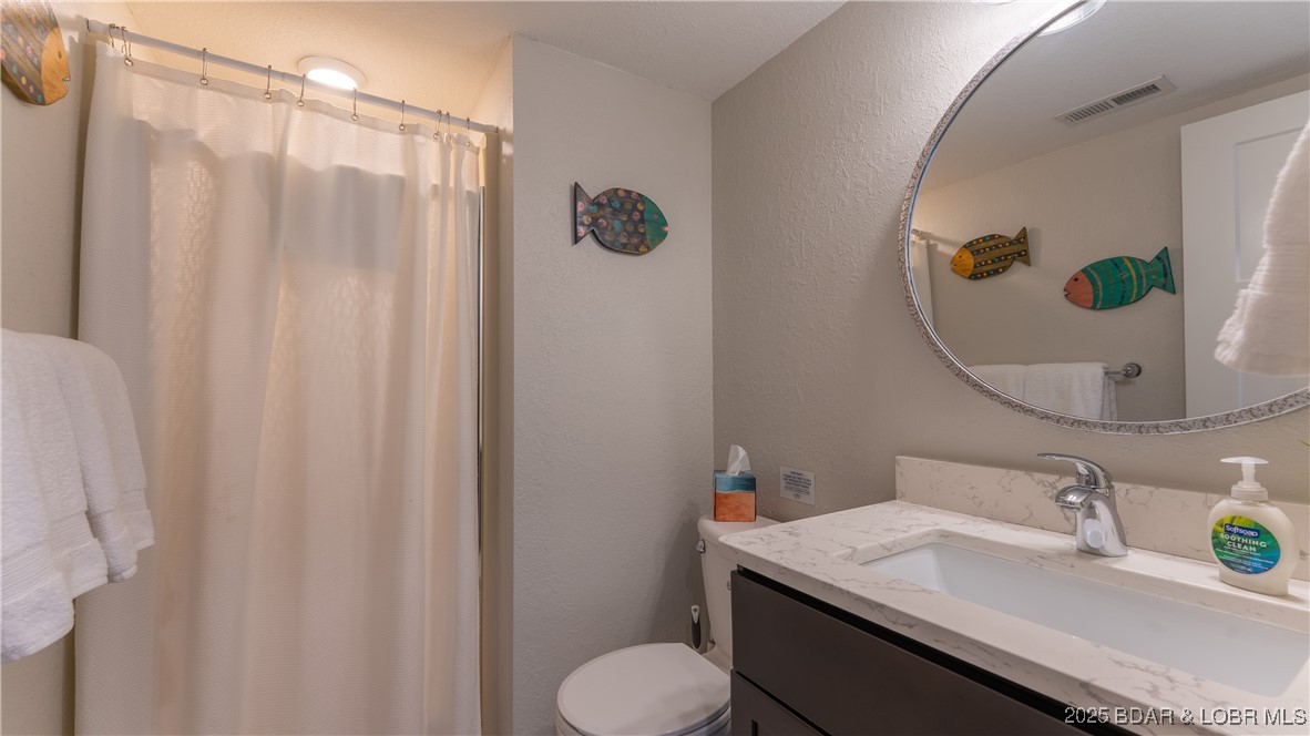 59 Ginger Point Lake Ozark, MO 65049 - Photo 23 of 38