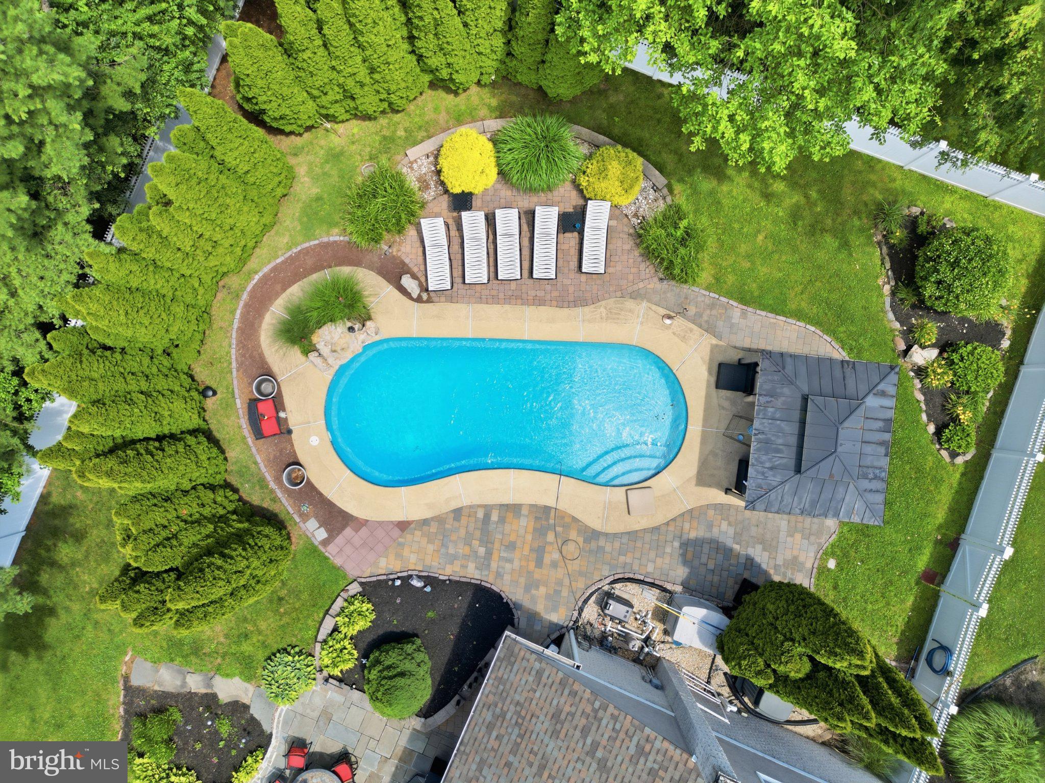 1002 Tannerie Run Road Ambler, PA 19002 - Photo 11 of 67 Serene backyard oasis with pool.