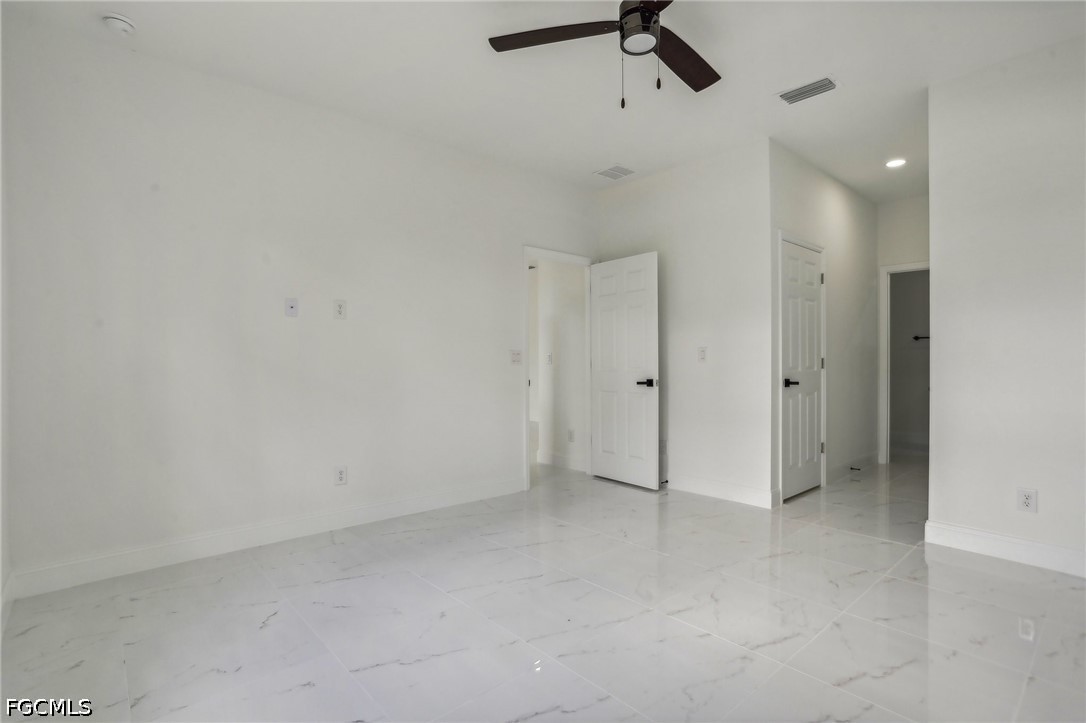 3408 14th Street Southwest Lehigh Acres, FL 33976 - Photo 14 of 24 a view of an empty room
