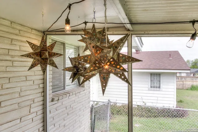 a view of a house with a small yard