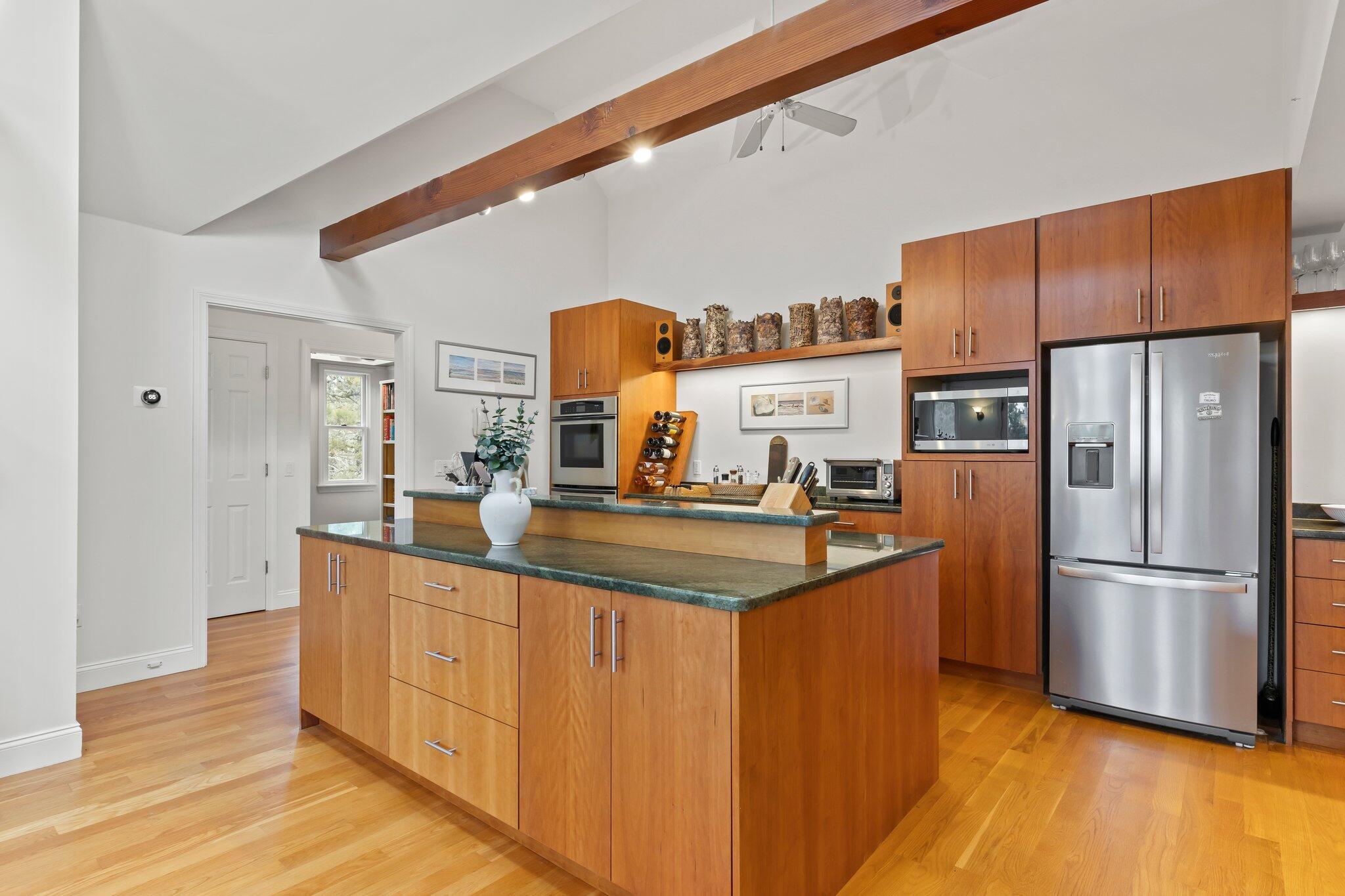 11 Sandy Lane Truro, MA 02666 - Photo 14 of 98 a kitchen with stainless steel appliances a sink and a refrigerator