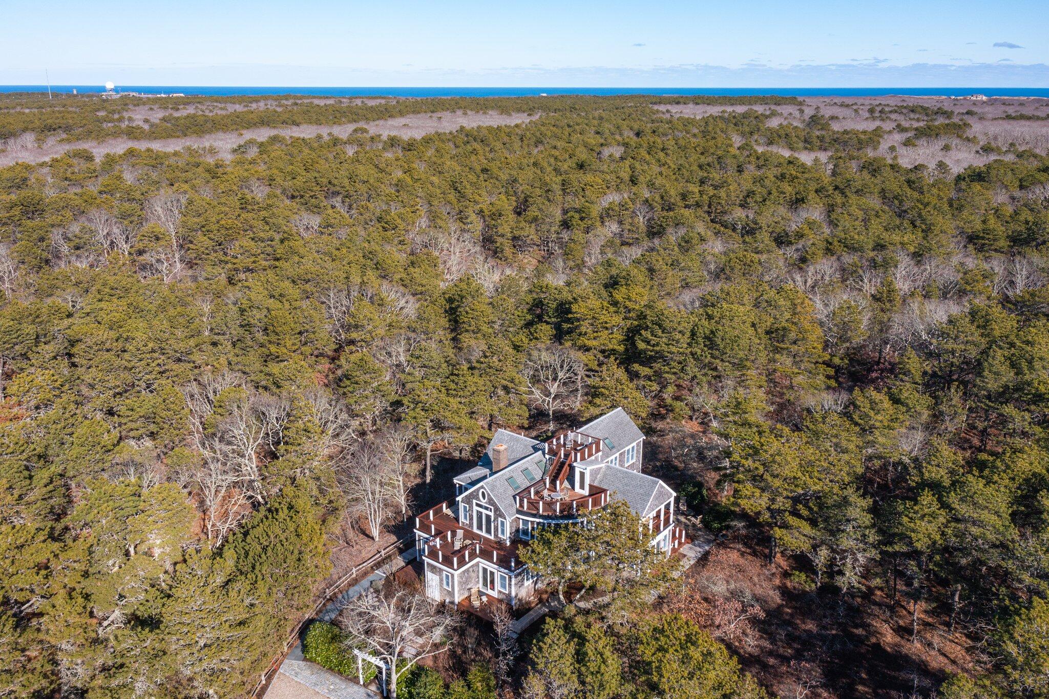 11 Sandy Lane Truro, MA 02666 - Photo 2 of 98 a view of a city with an outdoor space