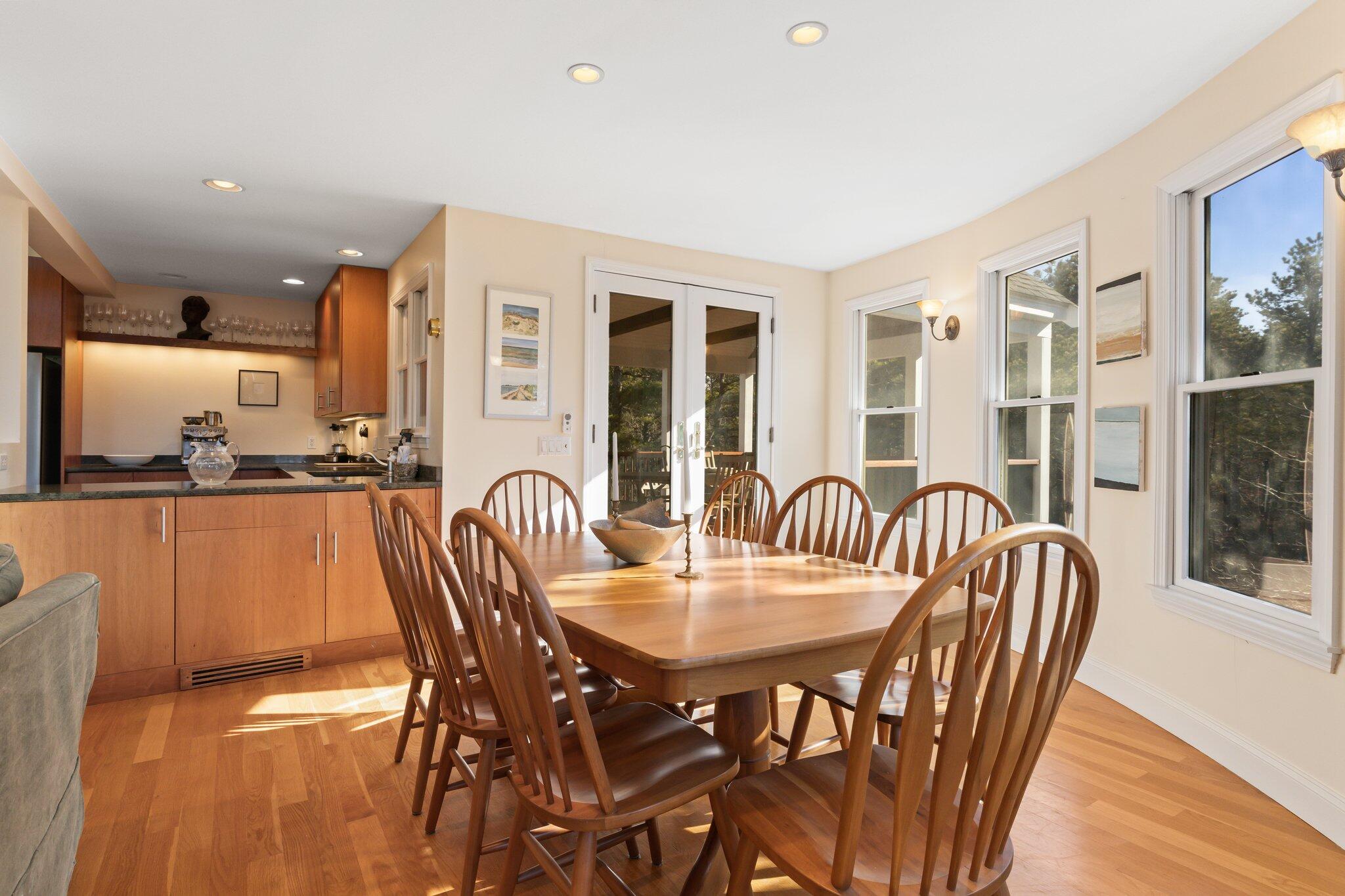 11 Sandy Lane Truro, MA 02666 - Photo 28 of 98 a dining room with furniture a window and wooden floor