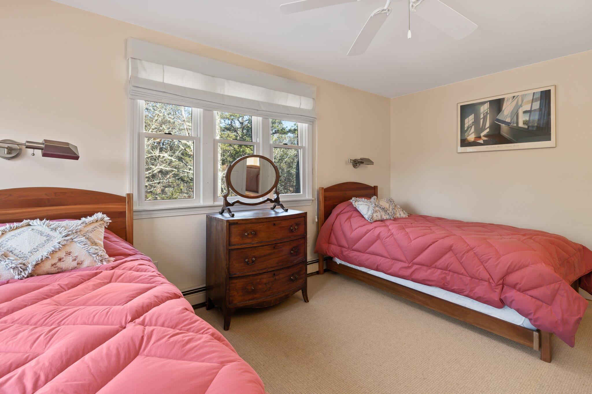 11 Sandy Lane Truro, MA 02666 - Photo 49 of 98 a bedroom with a bed and window