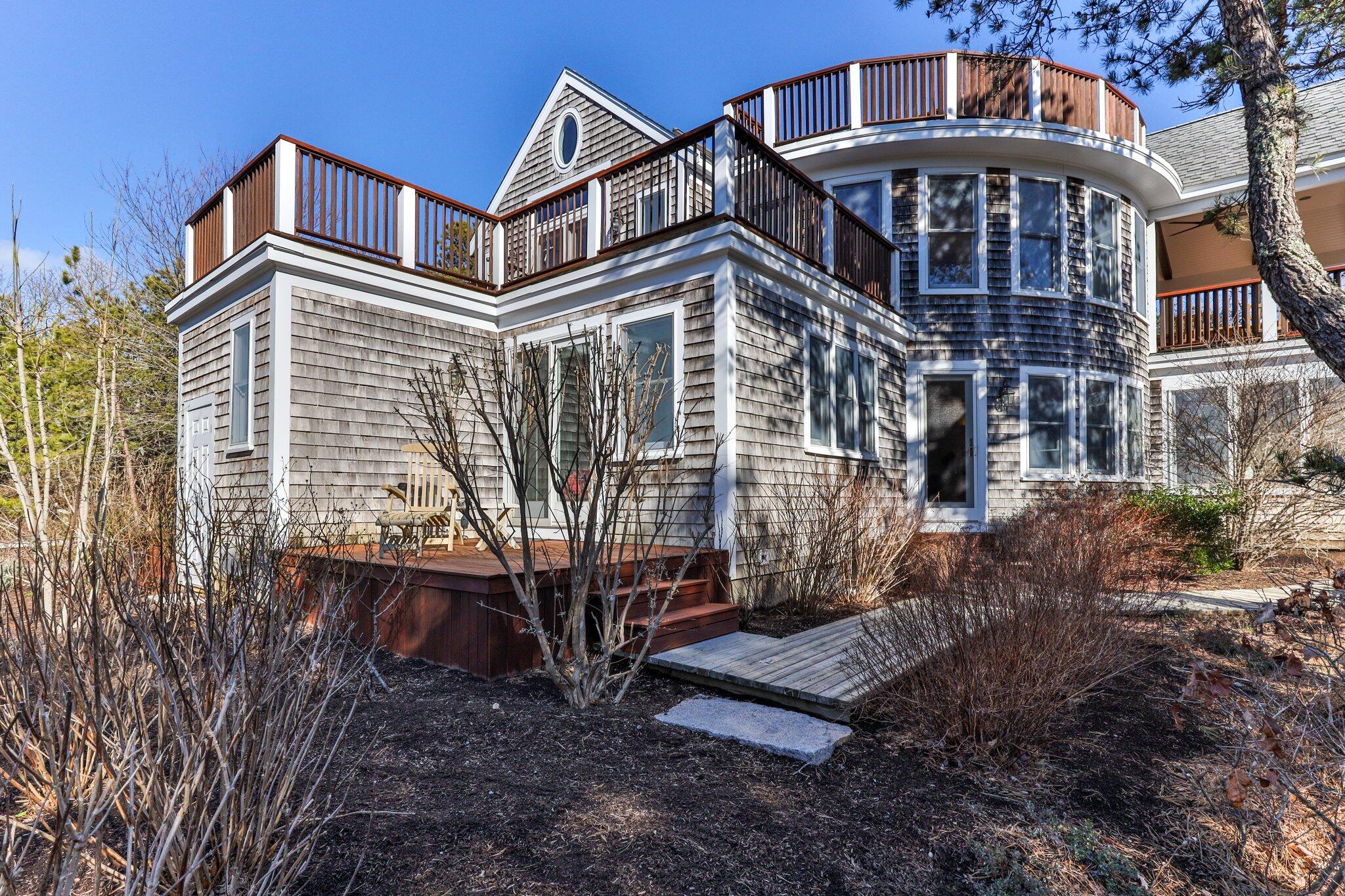 11 Sandy Lane Truro, MA 02666 - Photo 72 of 98 a front view of a house with a yard