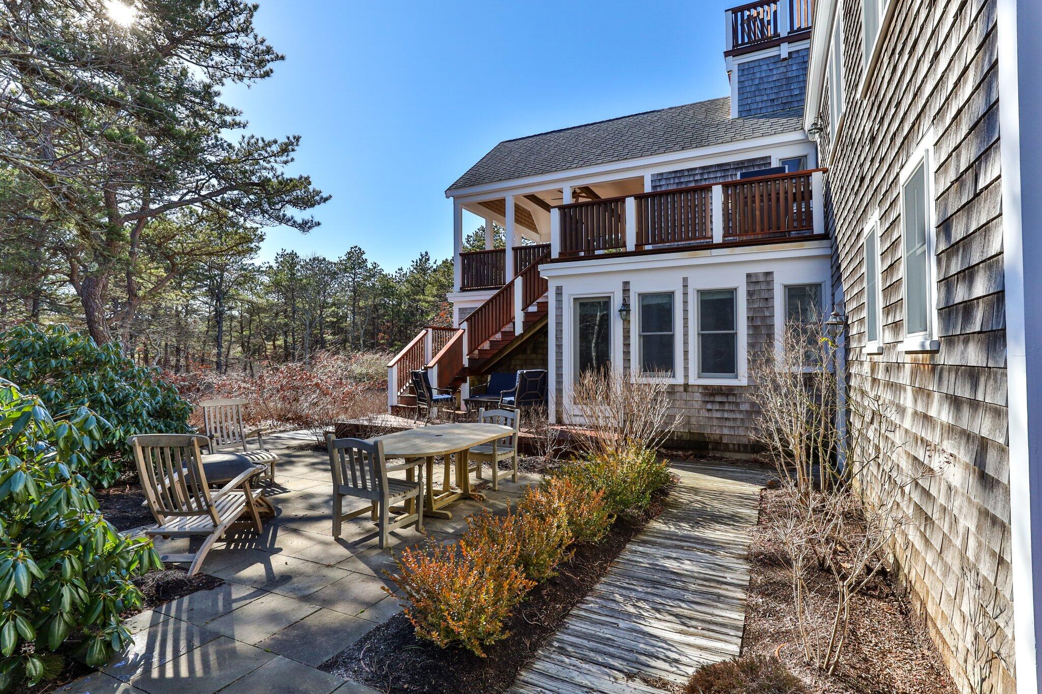 11 Sandy Lane Truro, MA 02666 - Photo 78 of 98 a view of a house with backyard and sitting area